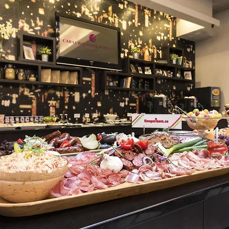 Отель Carat Boutique 4*